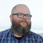 man with beard and glasses